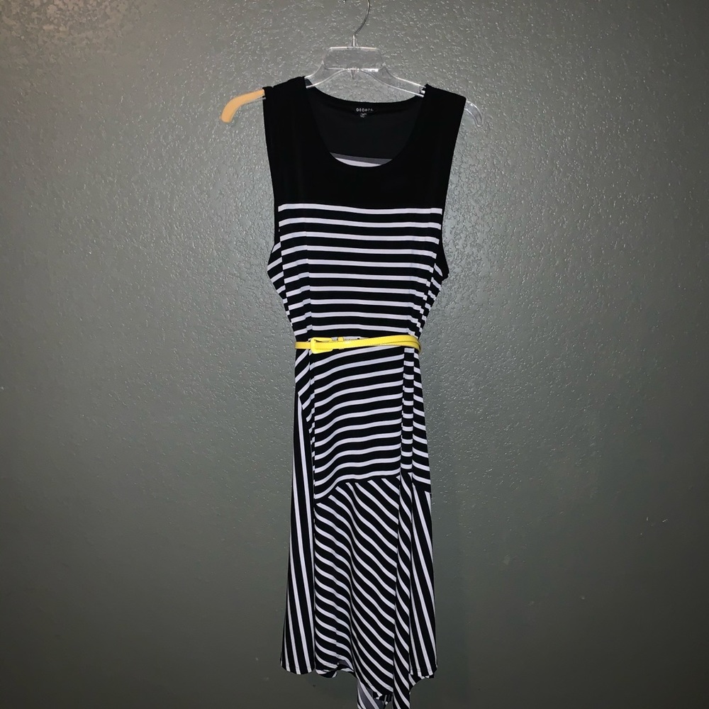 Black and white striped sleeveless dress.